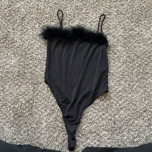 Faux fur trimmed black bodysuit (needs fixing)